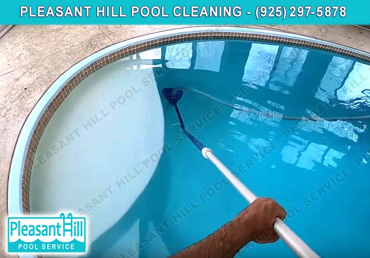 Cleaning a swimming pool in Pleasant Hill