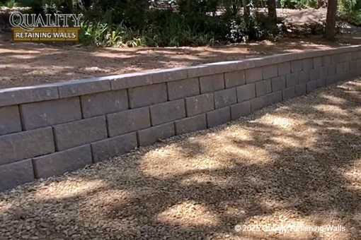 New concrete block retaining wall built to stabilize hillside in Rancho Paraiso area, Walnut Creek, CA