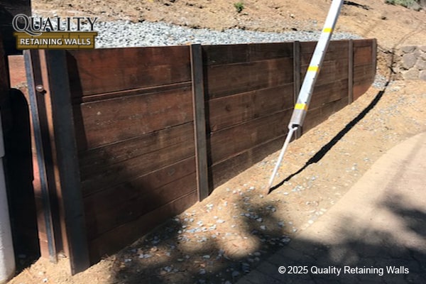 Repaired wood retaining wall inspected after restoration in Acalanes Ridge neighborhood, Walnut Creek, CA