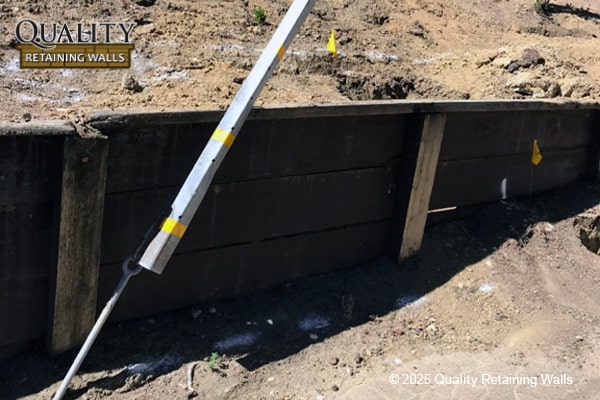 Damaged wood retaining wall leaning and failing before repair in Acalanes Ridge neighborhood, Walnut Creek, CA