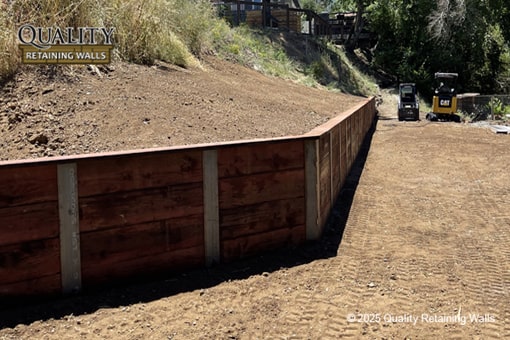 Completed wood retaining wall providing slope stability in Rancho San Miguel/Brooktree North area, Walnut Creek, CA