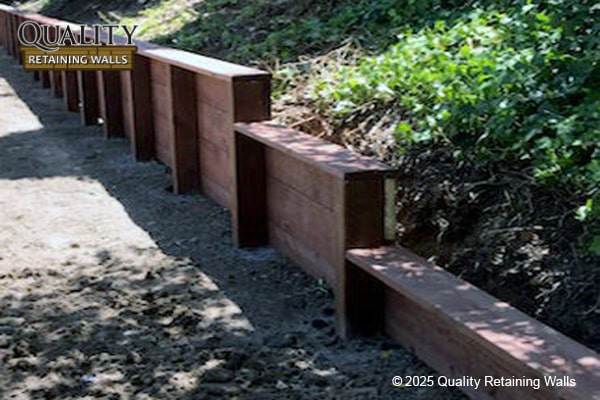 Custom wood retaining wall built for a San Ramon residential property, featuring multiple wall levels to manage slope and drainage